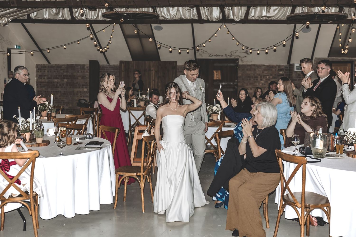 Documentary wedding day at a large open space barn