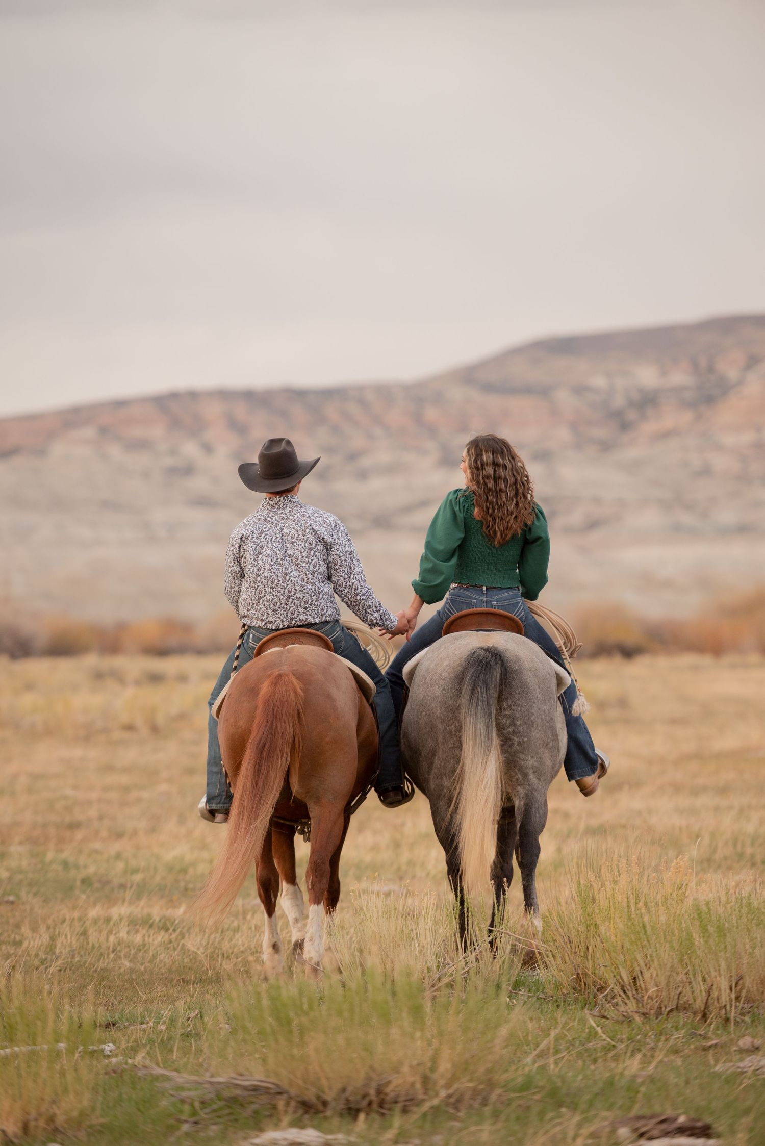 Lonetree Wyoming engagement photos on horseback for this cowboy couple.