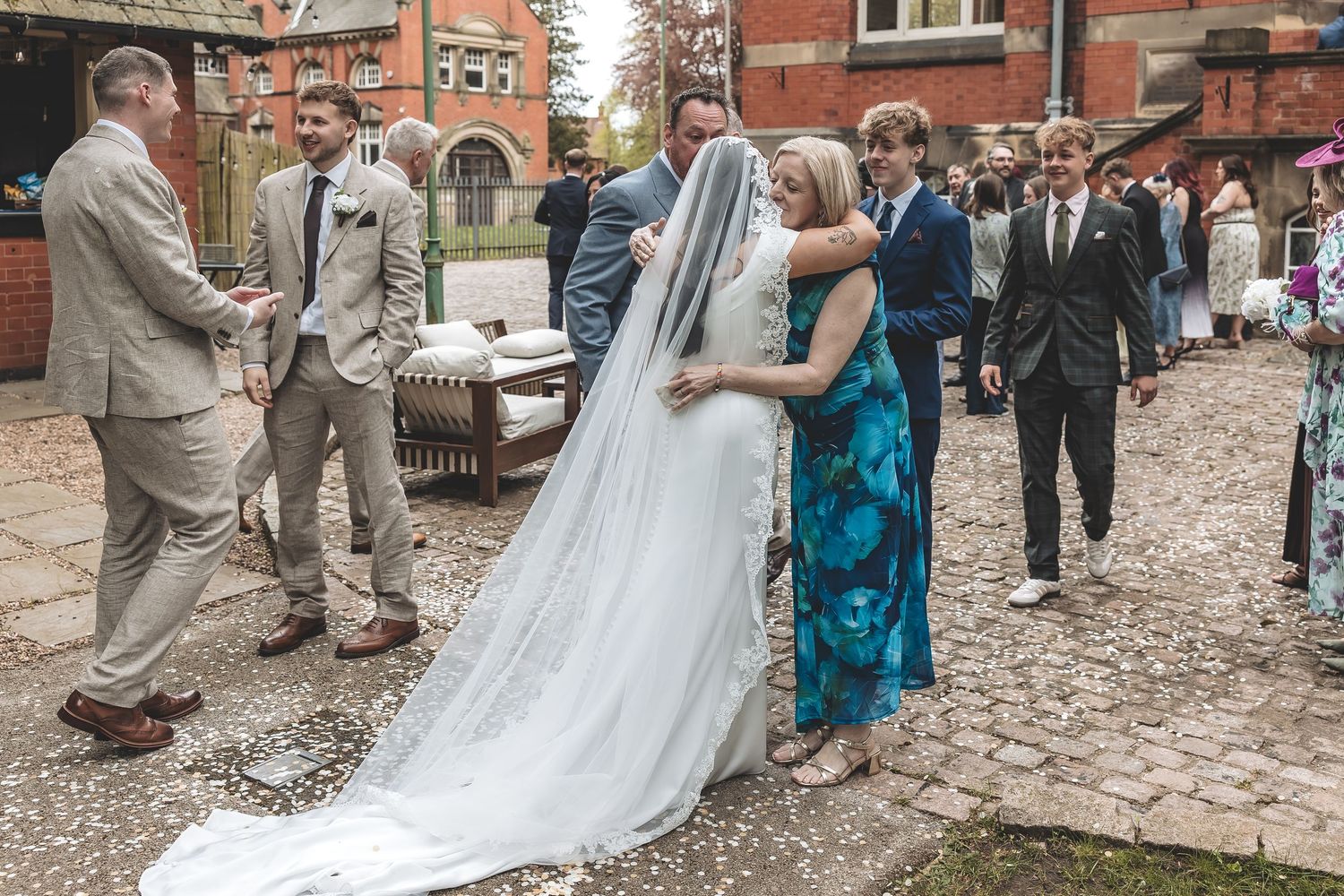 Couple interacting naturally during wedding day.