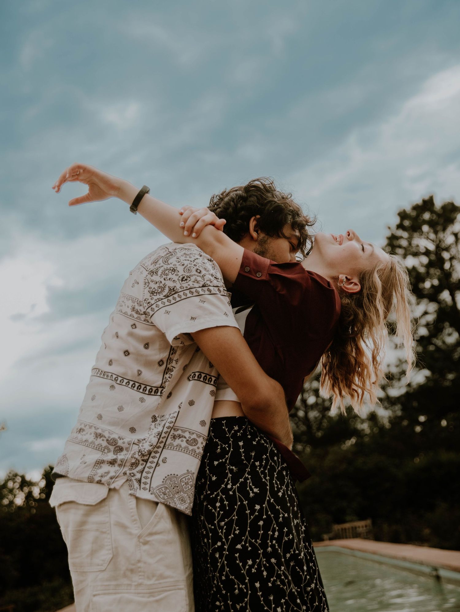 Couple embraces each other for candid couples, engagement photos, elopement, and cinematic photos in Denver, Colorado