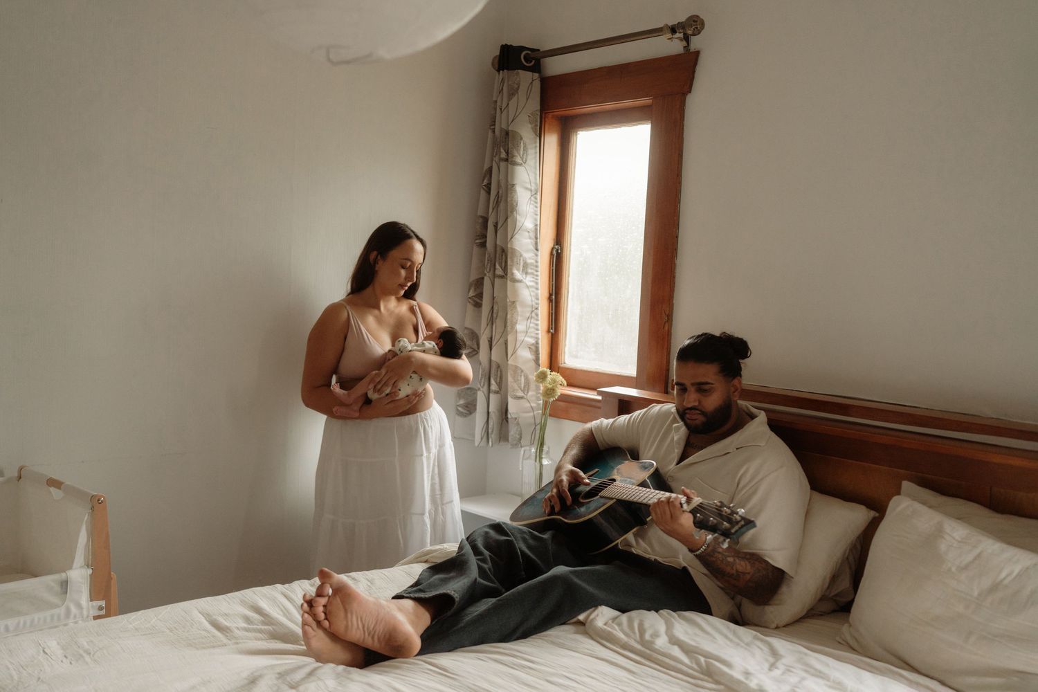 baby in home session with family natural relaxed lifestyle