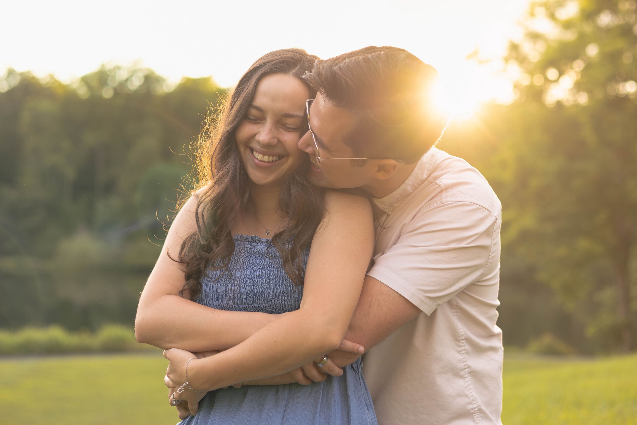 Golden Hour Couples Session at Walnut Creek Park with sunset in the background.