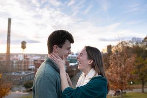 Engagement Session at Libby Hill Park in Richmond, Virginia with city in the background.