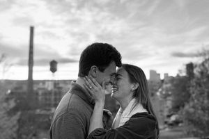 Black & White Engagement at Libby Hill Park in Richmond, Virginia with the city of Richmond in the background.