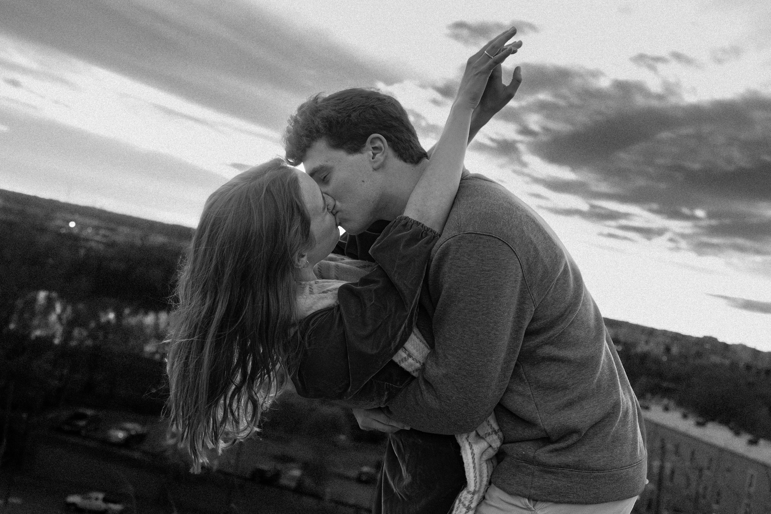Black & White Engagement at Libby Hill Park in Richmond, Virginia with a sunset in the background.
