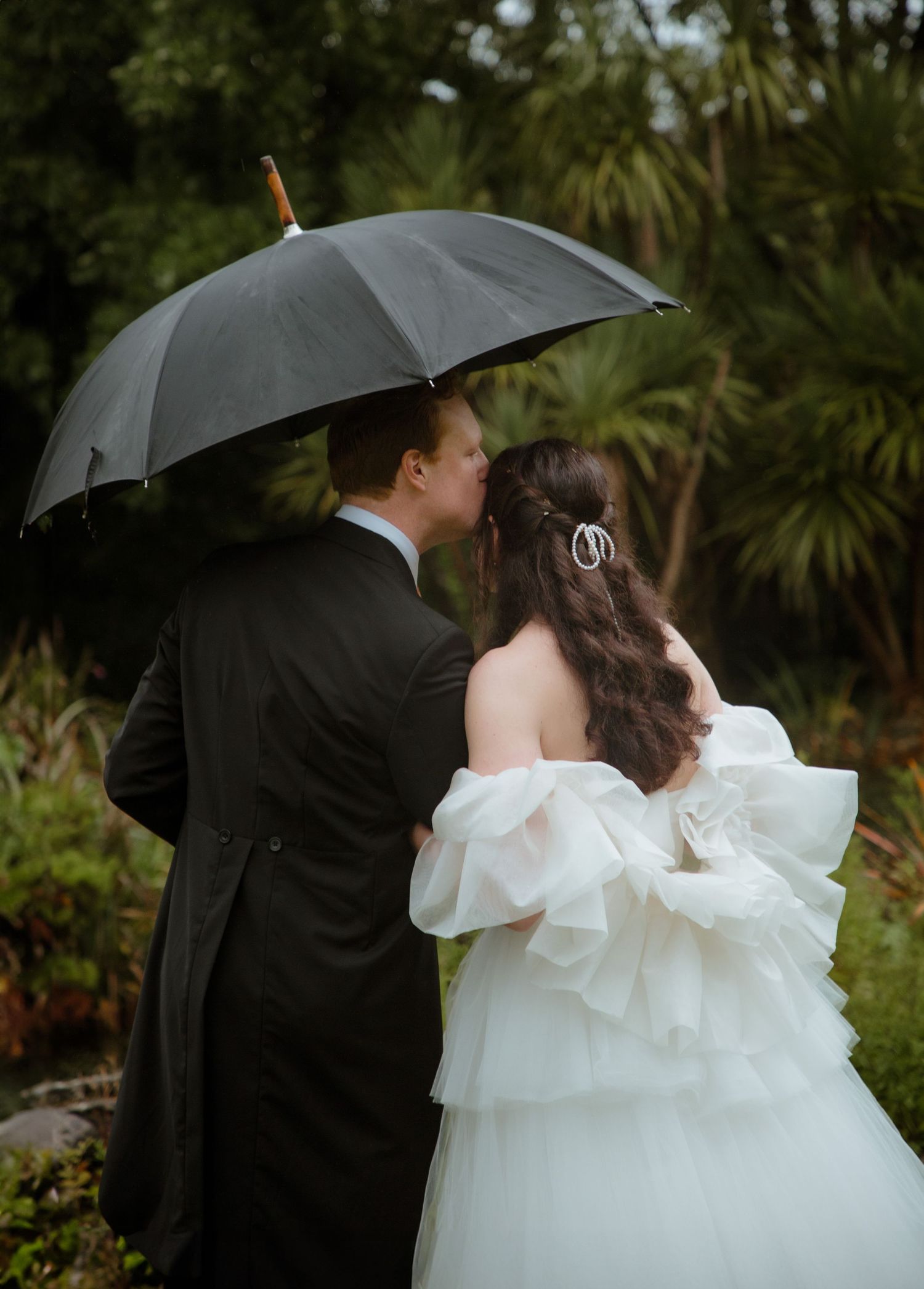 wedding portraits bride and groom love portraits elegant romantic wedding dress umbrella luxury wedding tailcoats photography documentary