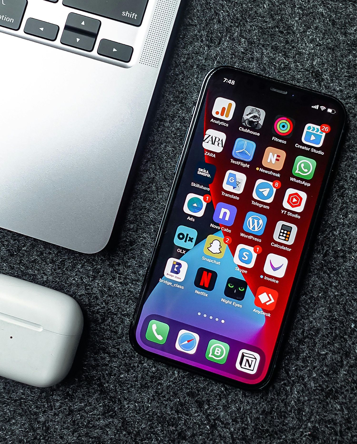Photo of an iPhone with social media apps on display