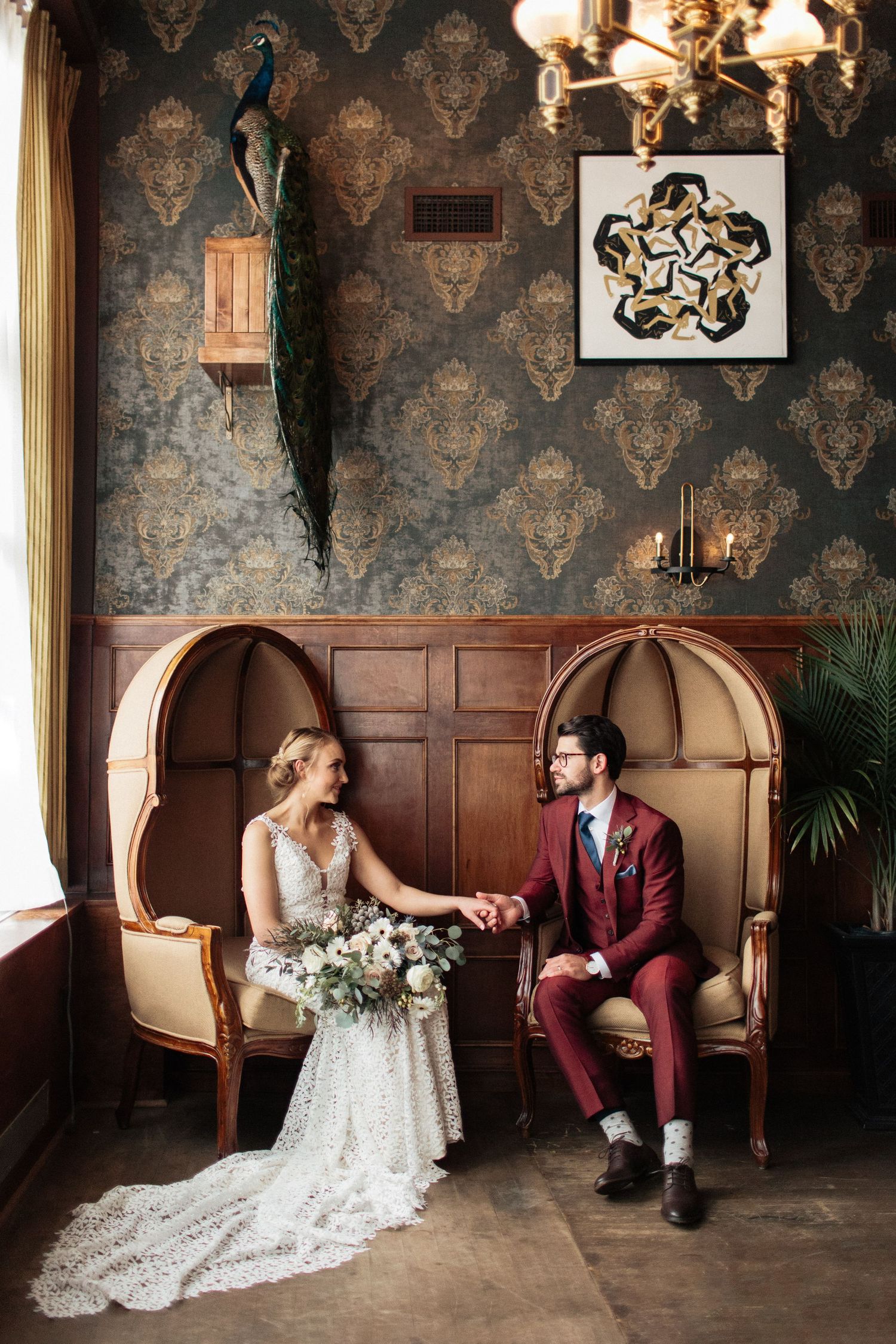 Charleston Wedding Photographer - Bride and Groom sitting in vintage cocktail lounge editorial