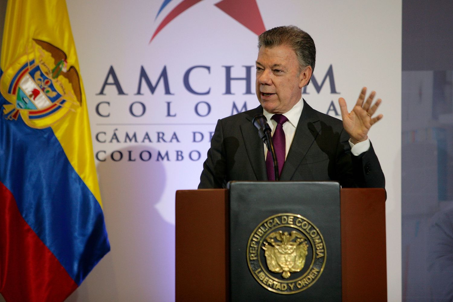 Juan Manuel Santos, President of Colombia talk during a conference.