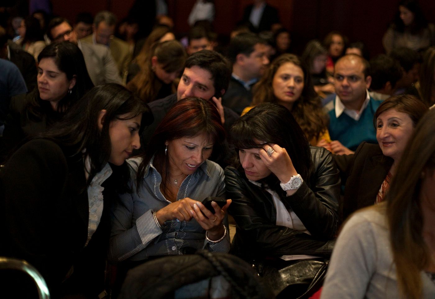 People attend a conference.