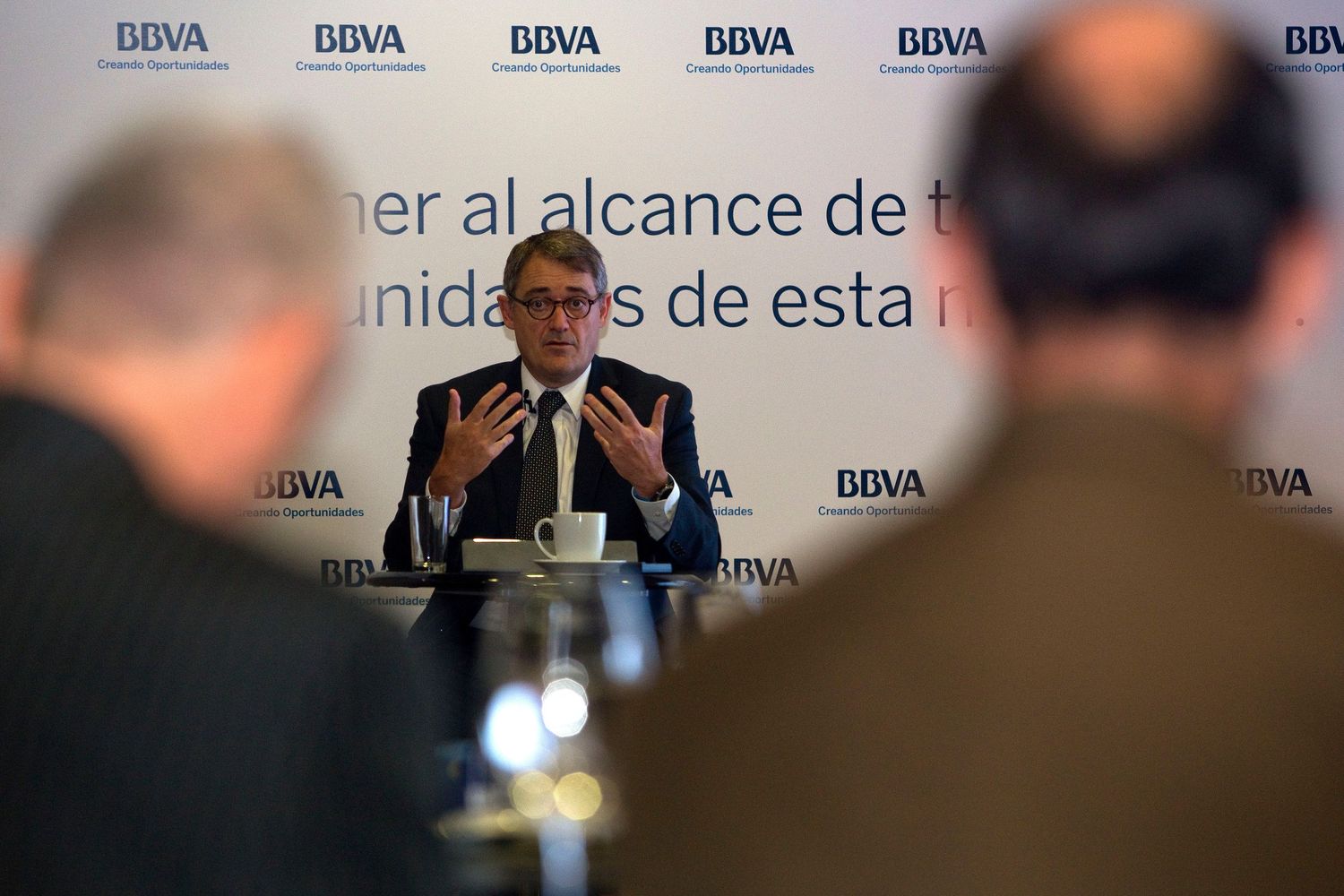 A BBVA banker speaks during a conference in Bogotá, Colombia.