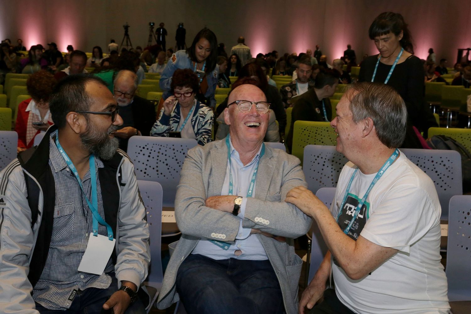 People attend a conference.