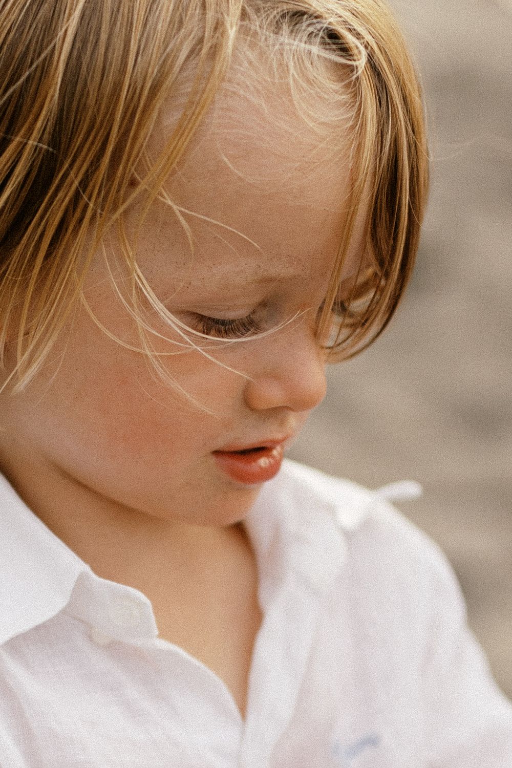 Close-up portrait showing soft natural lighting and delicate features.