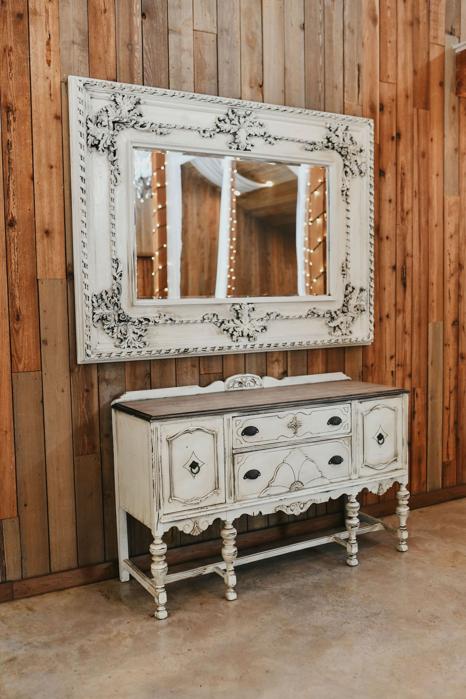dreamy white rustic modern cake table for your wedding cake at our favorite wedding venue in valley view, tx