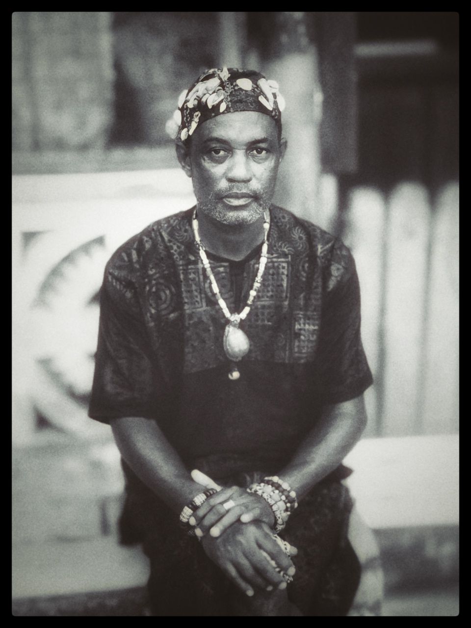 A traditional Ga man adorned in his finery wear captured by Dennis Fofie