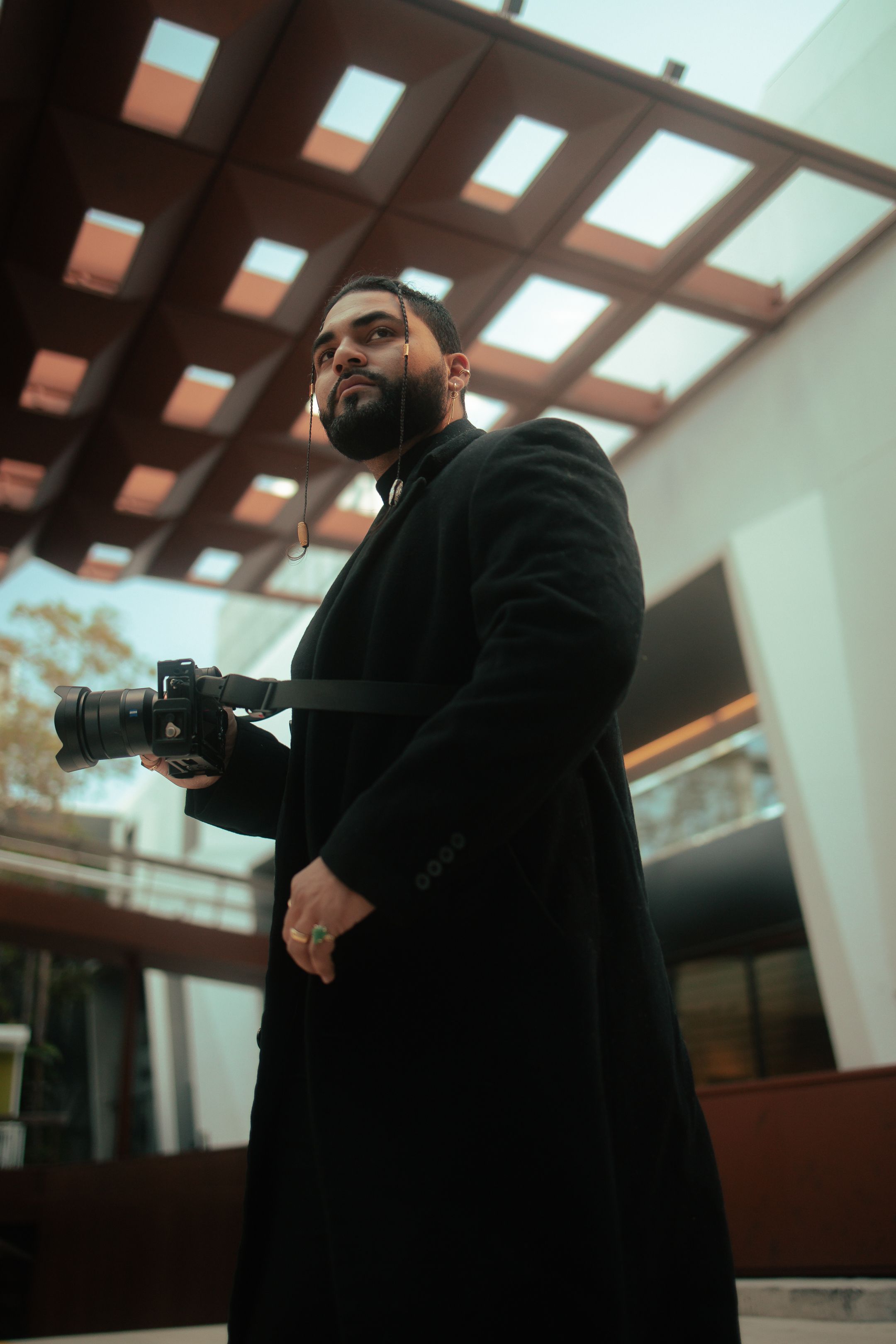 Miami fashion editorial portrait on city steps by Mannyportraits, cinematic photography with luxury designer style for South Florida brands.