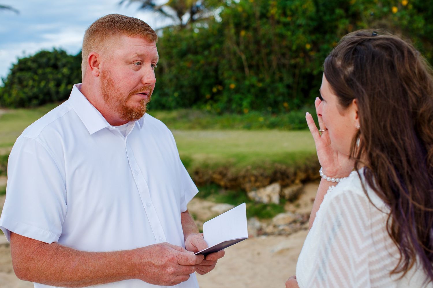Elopement on the beach at Balneario del Escambrón in Old San Juan, Puerto Rico. Wedding ceremony. Bride and groom.
