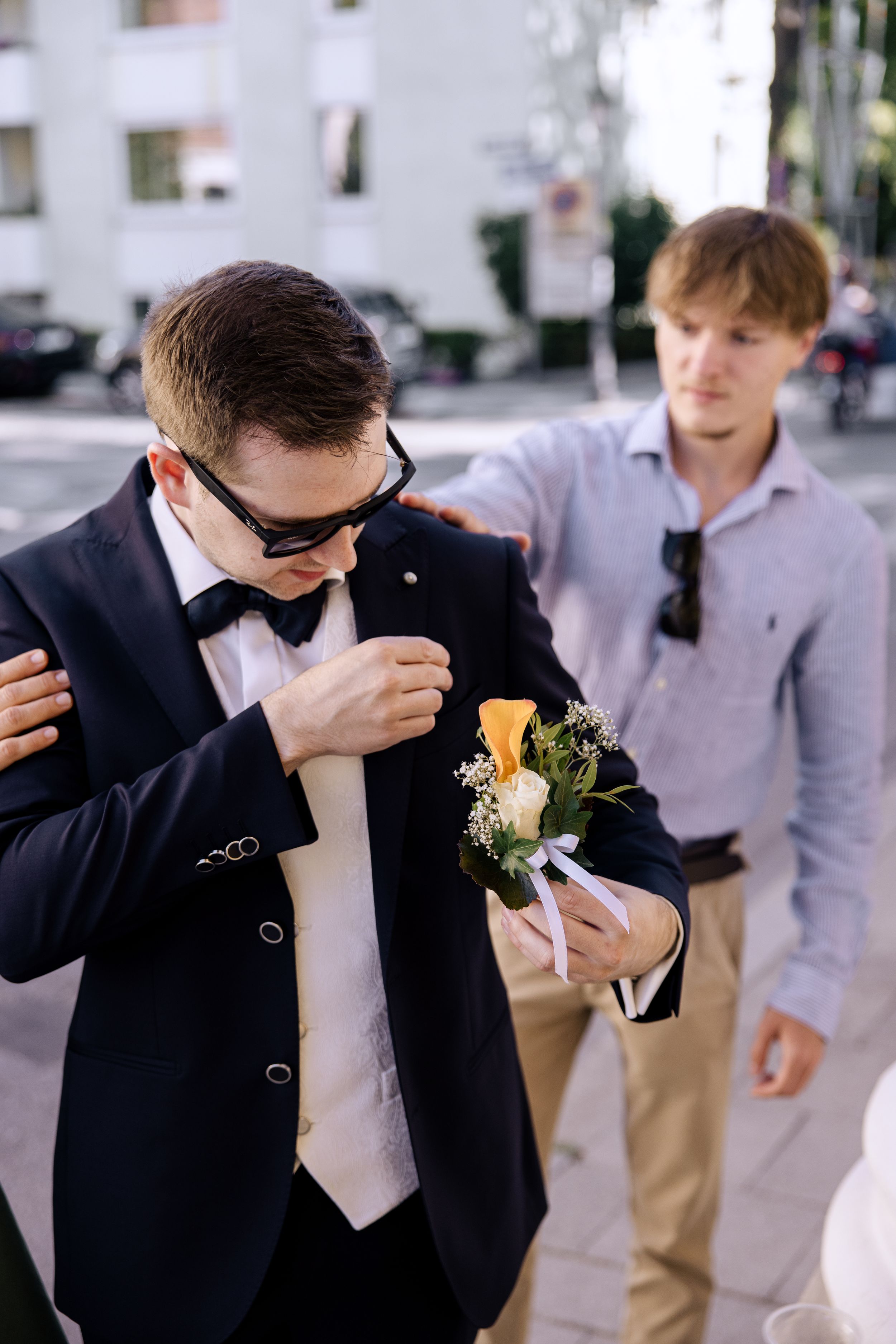 Progressive sequence showing groomsmen getting emotional during a wedding ceremony.