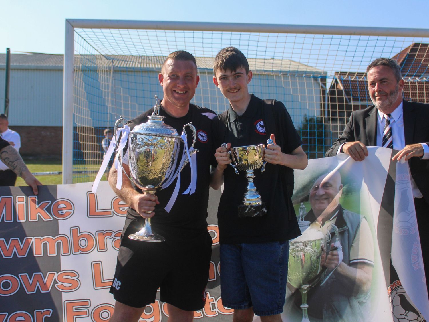 People with trophies