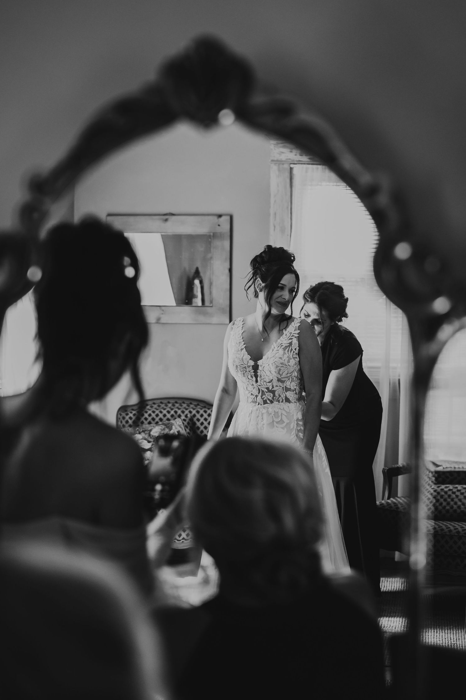 A series of vintage black and white photos showing silhouettes of people in an indoor setting.