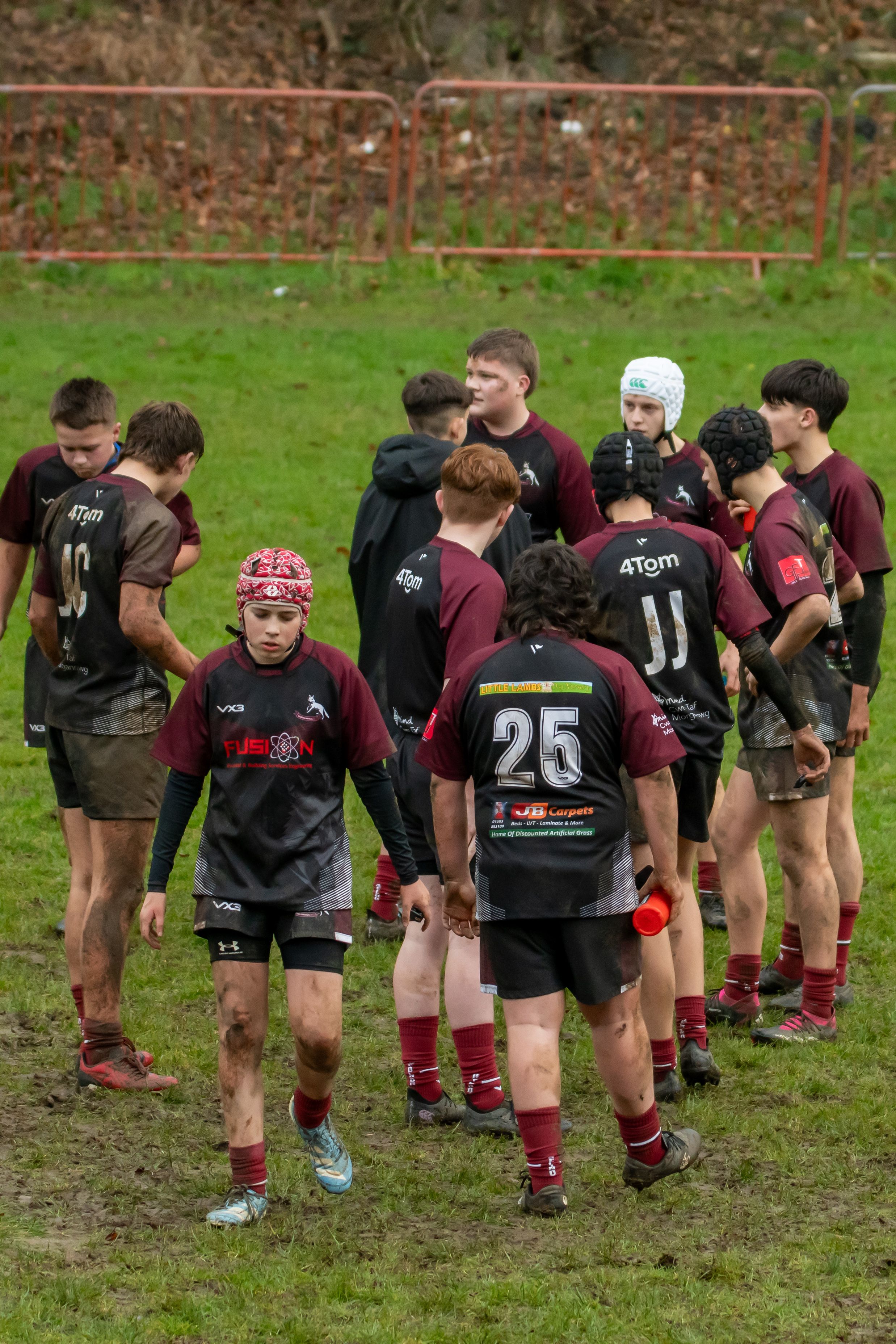 Both teams shake hands after the end of a game.