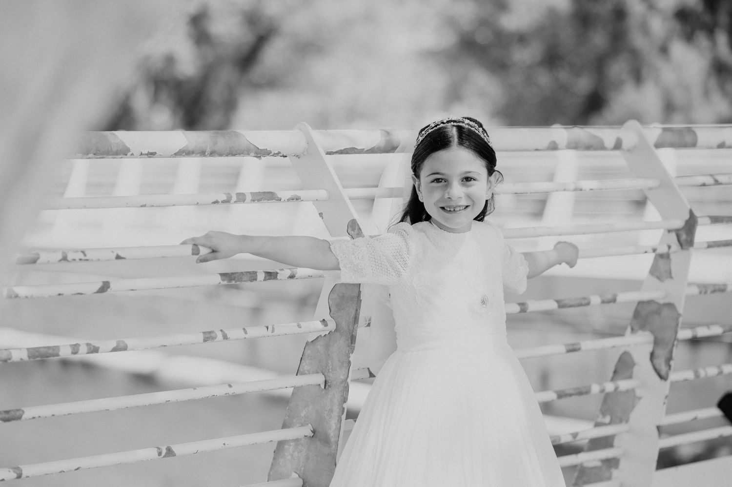 Black and white portrait series showing someone seated on outdoor benches.