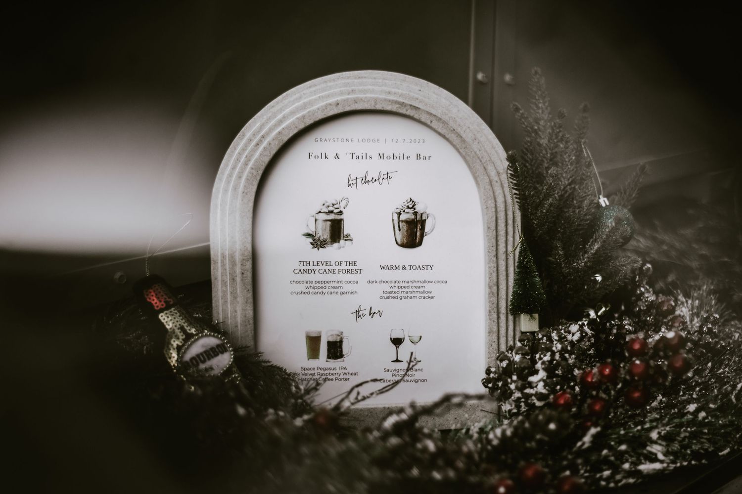 Black and white photo of vintage coffee menu signage with drink illustrations.