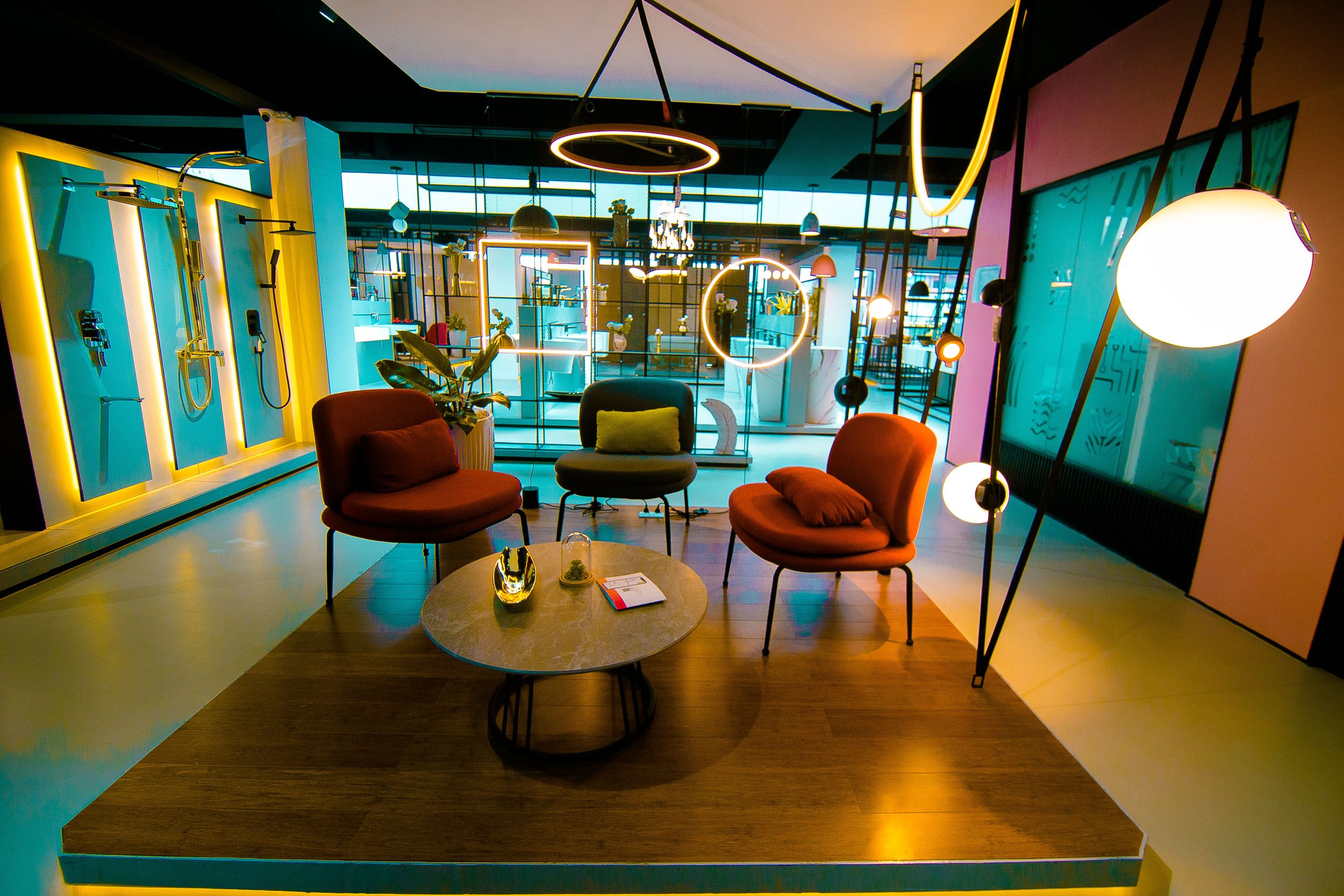 Contemporary office space with colorful accent walls and modern furniture arrangements.