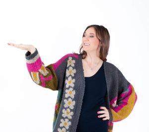 Woman wearing colorful striped cardigan with floral details poses in multiple playful positions against white background.