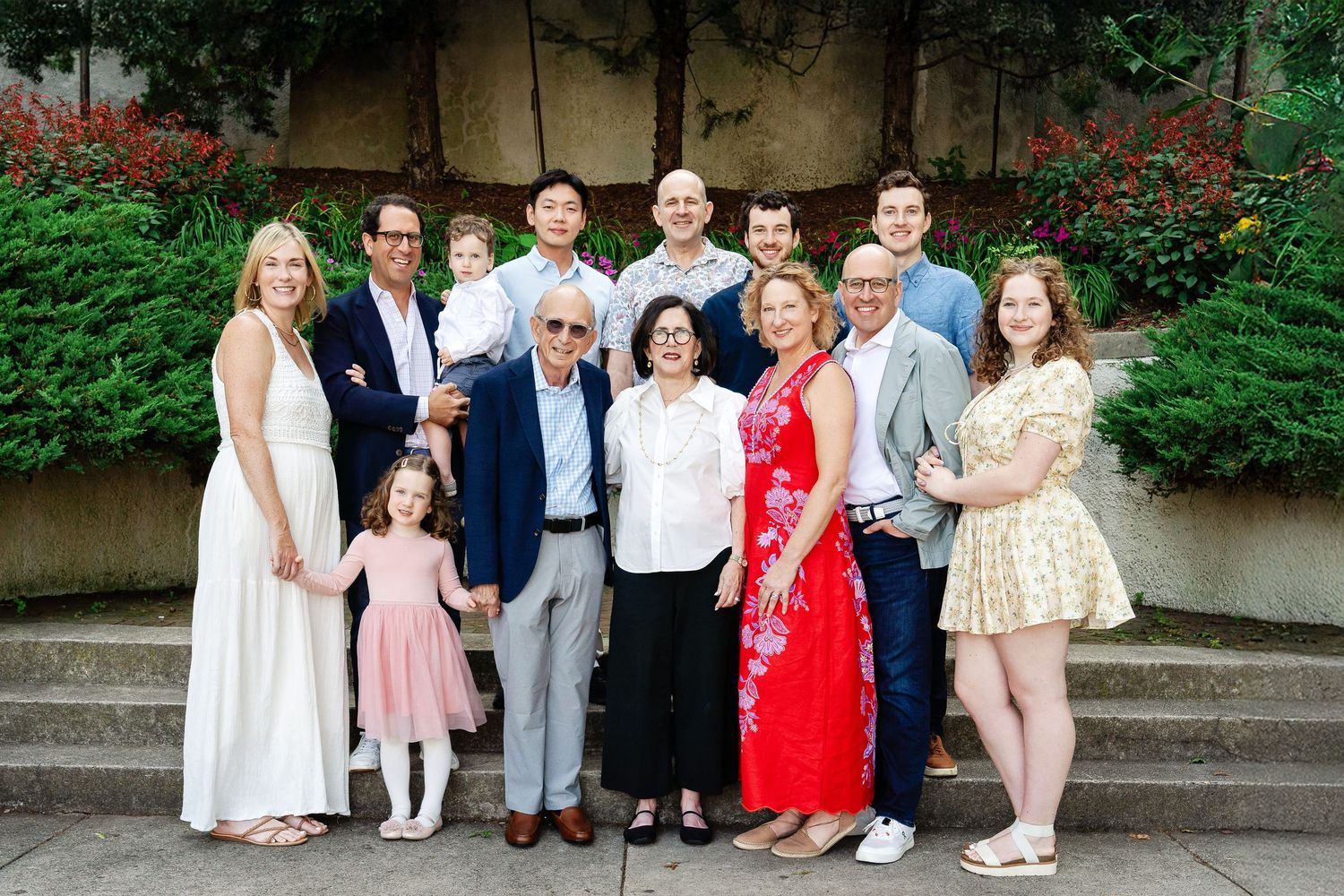 An extended family standing on a stairway taken by Milwaukee family photographer Rachel Dickman.
