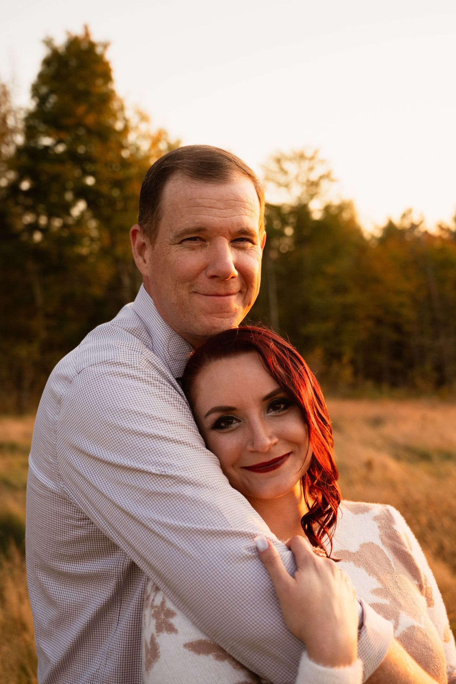 An intimate couples portrait session in warm sunset lighting.