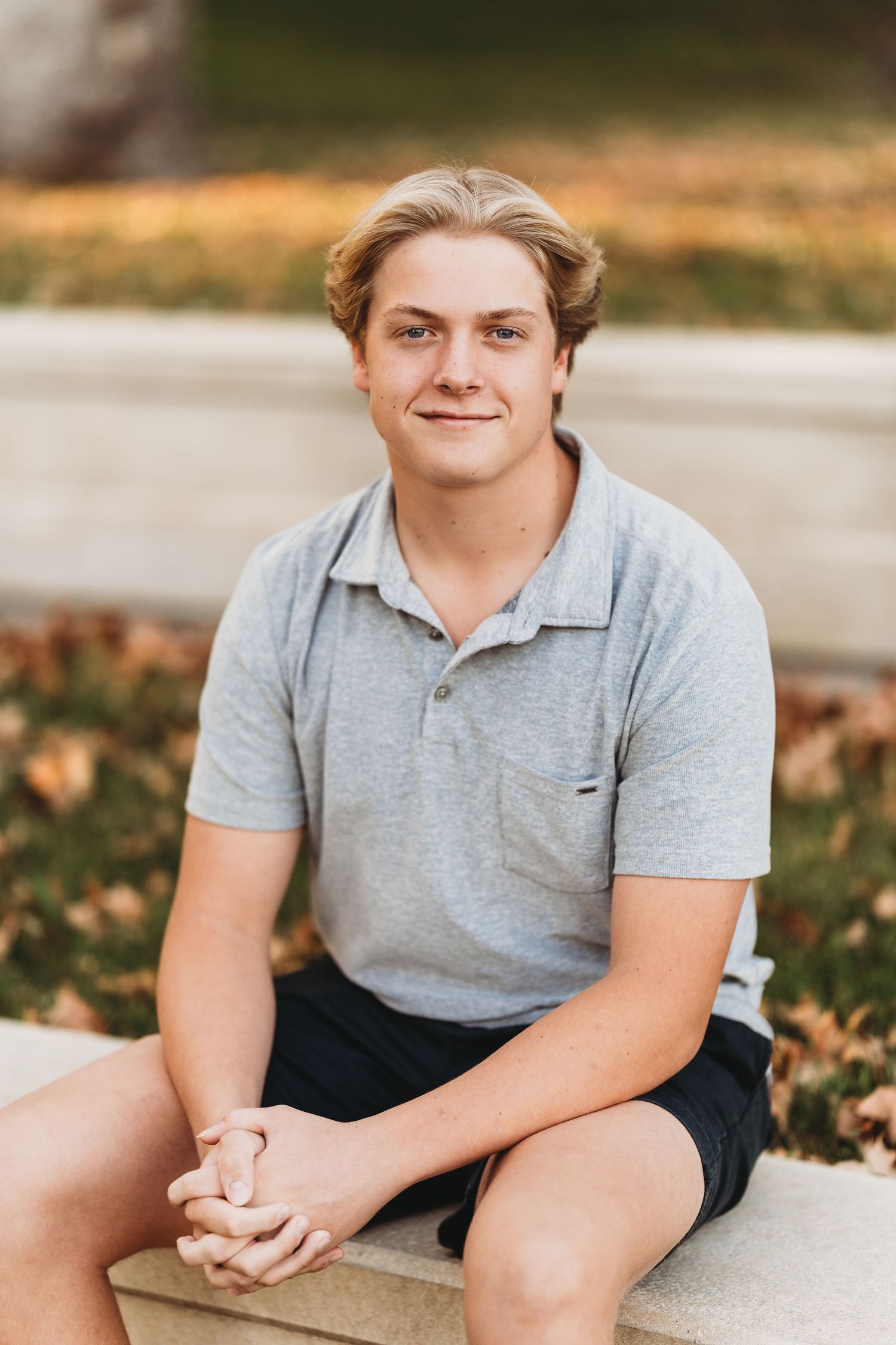 A series of casual outdoor portrait shots showing someone sitting on concrete steps surrounded by autumn leaves.