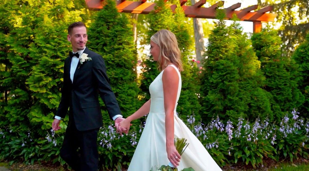 Garden wedding photography session with elegant decor and natural greenery backdrop.