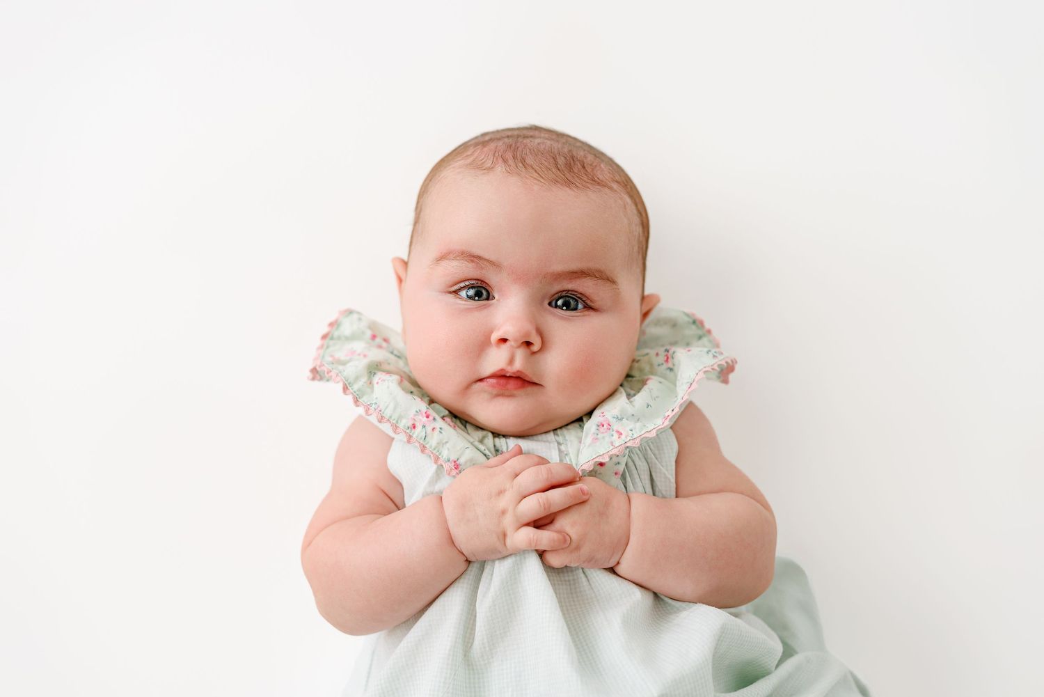 birds-eye view of baby laying down