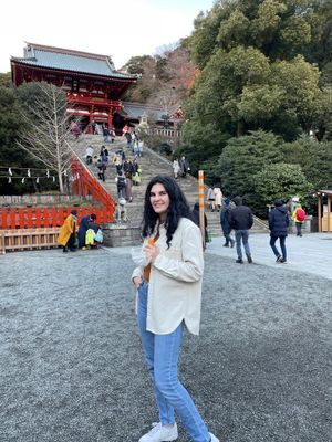 A photo of Brenna in front of a Shrine in Kamakura, Japan
