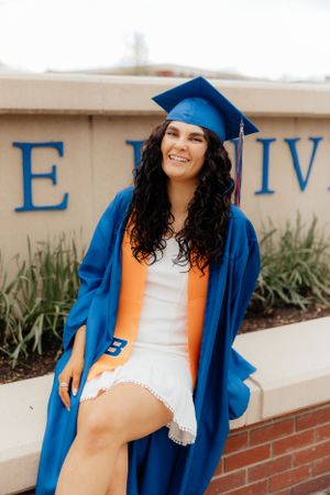 A grad photo of Brenna in her cap and gown