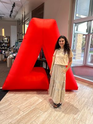 A photo of Brenna at an Adobe Software event