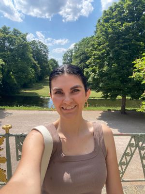 A selfie of Brenna at a garden in Germany