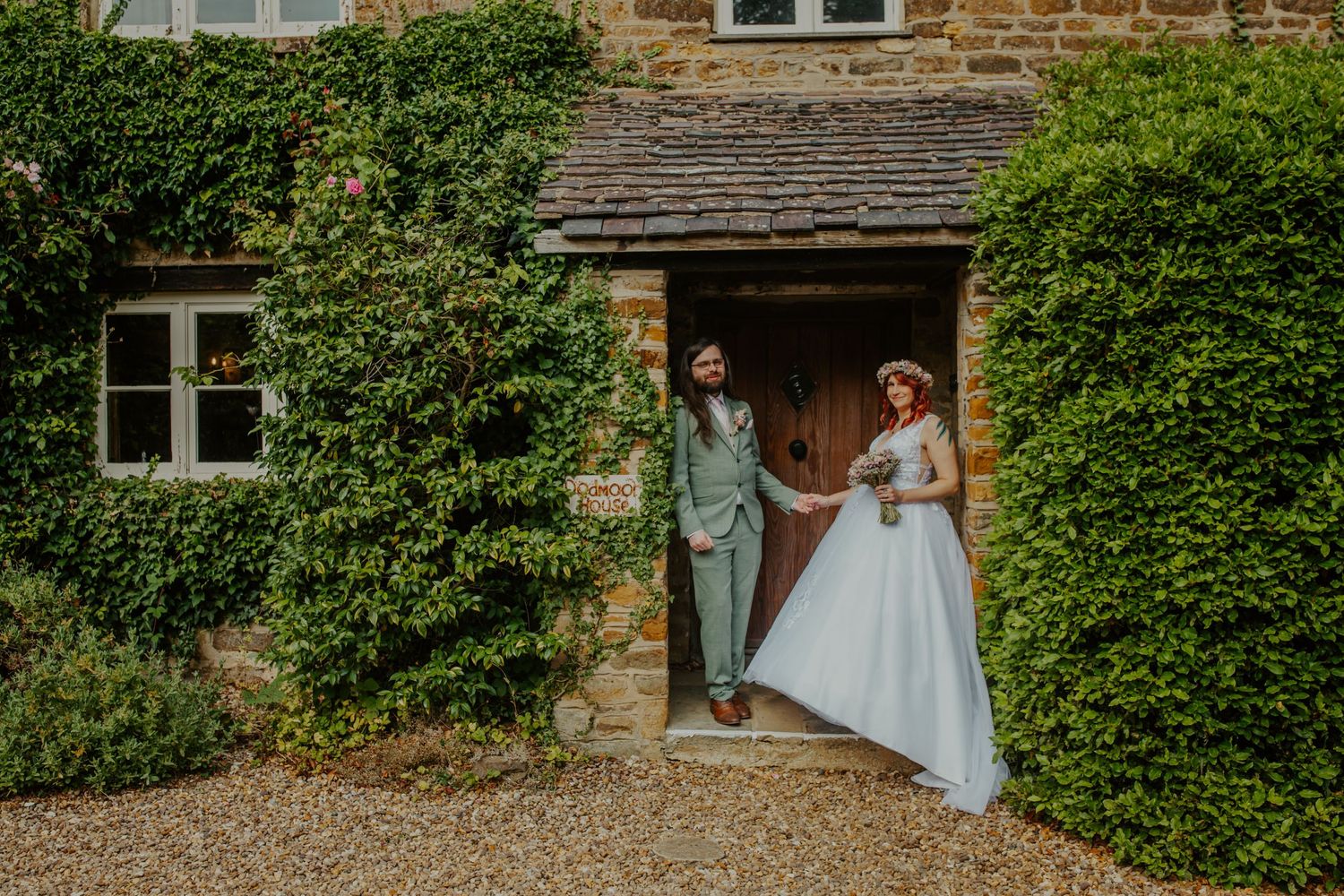 Bride and groom at their wedding at  Dodmoor House, Dodford, Northamptonshire