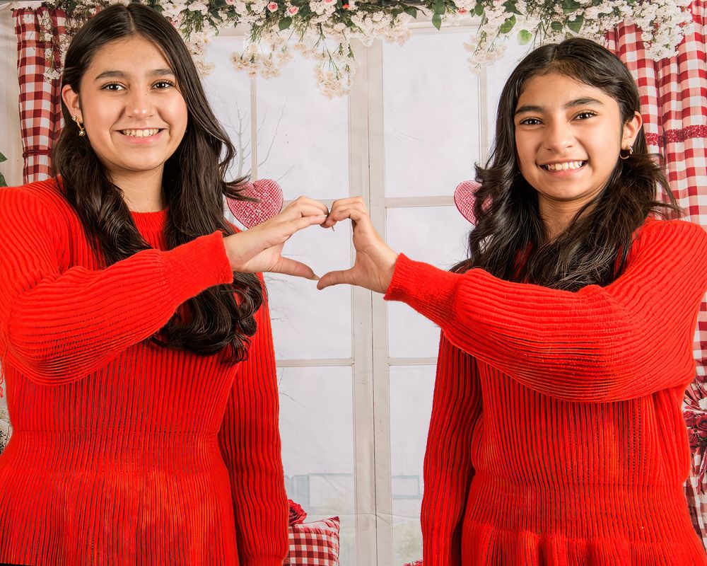 A person in a bright red sweater poses against a red and white checkered background in a photo collage.