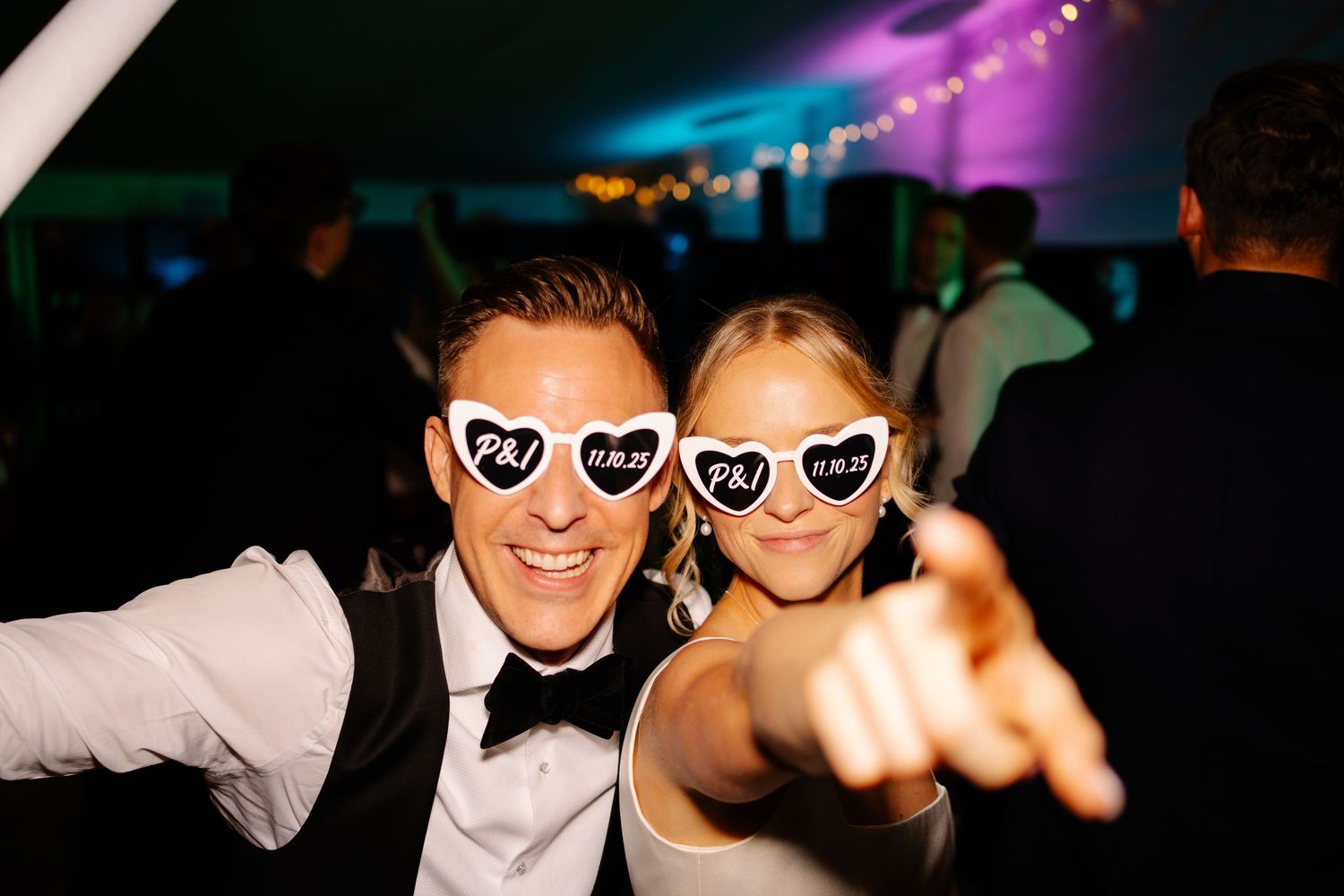 Bride and groom’s first dance under fairy lights in a Pylewell New Forest wedding venue
