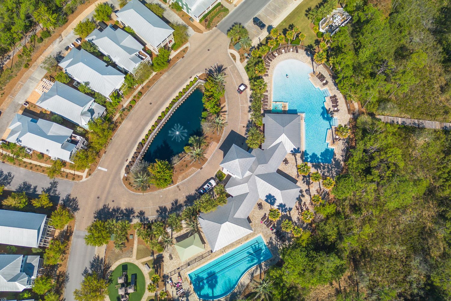 Aerial view of a charming neighborhood in 30A FL, captured by drone photography.