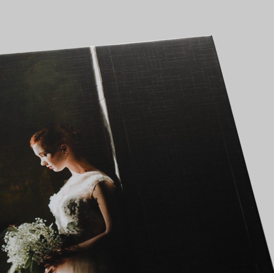 "Detailed view of the Matte texture and finish of a professionally printed wedding photo.