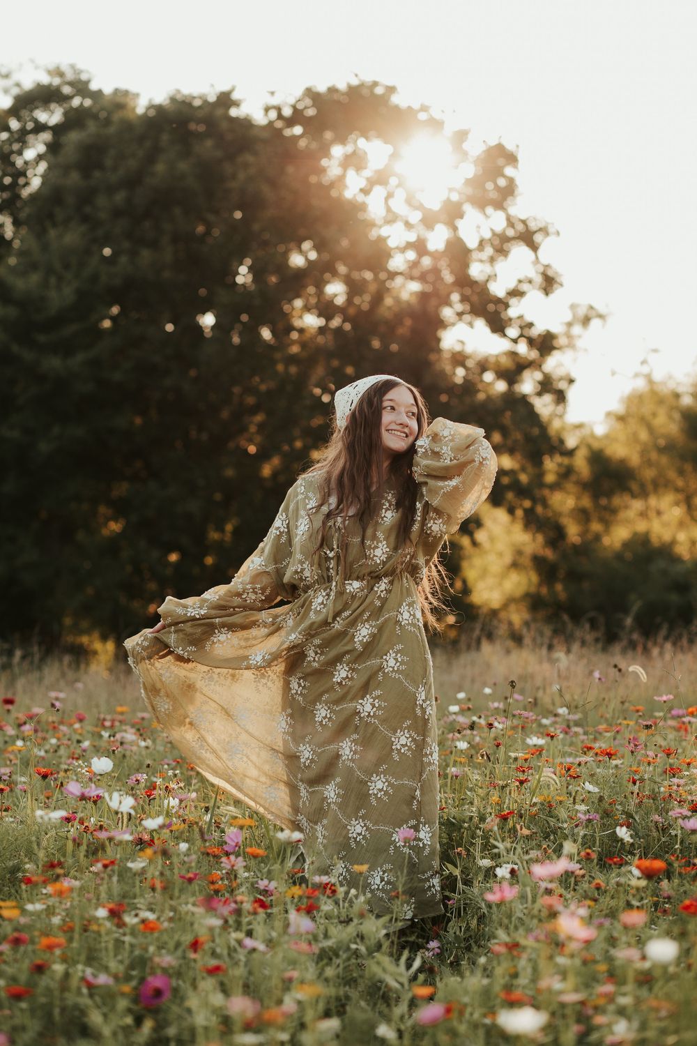 girl in flowers at sunset