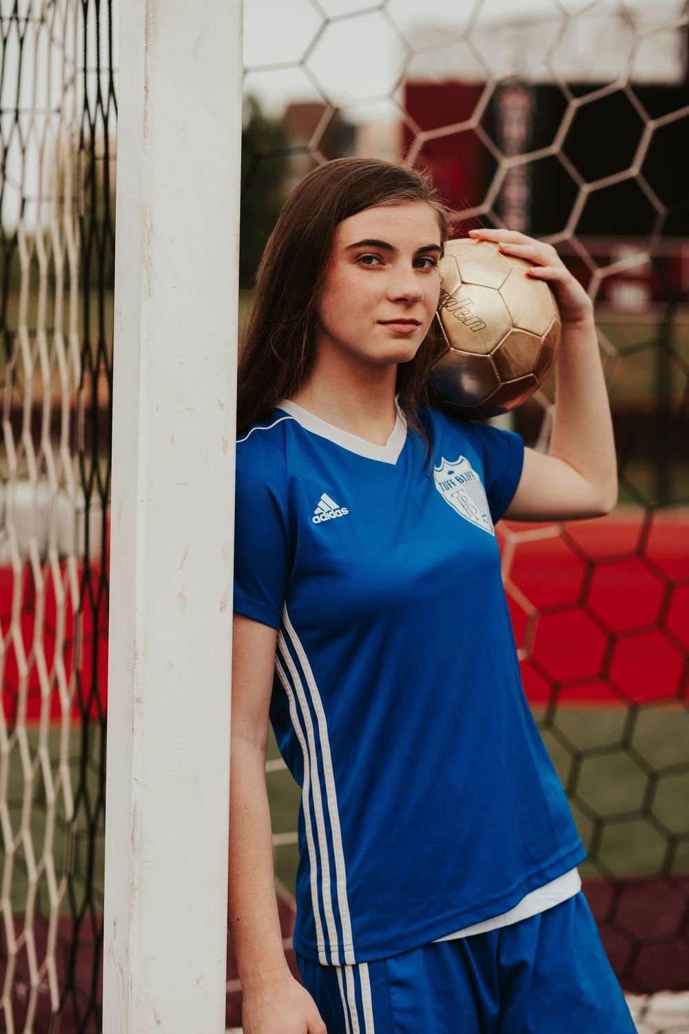 girl with a soccer ball