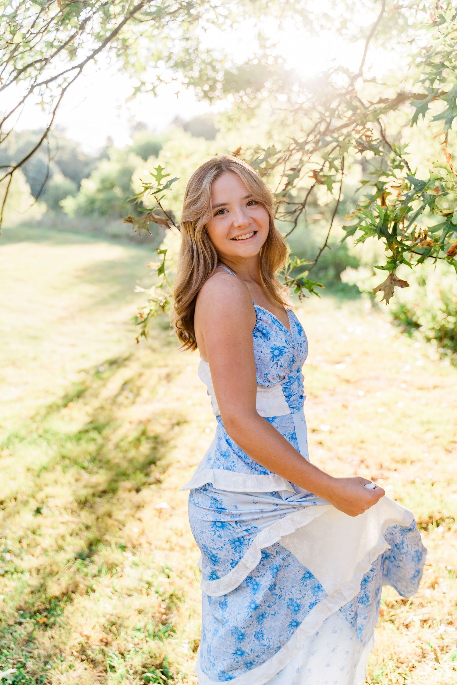 Summer portrait in a field for Toledo senior session