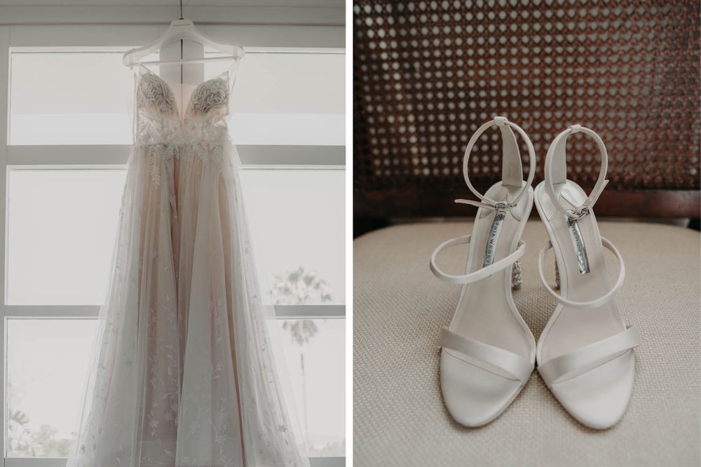 Wedding dress and white heeled sandals displayed before the ceremony.