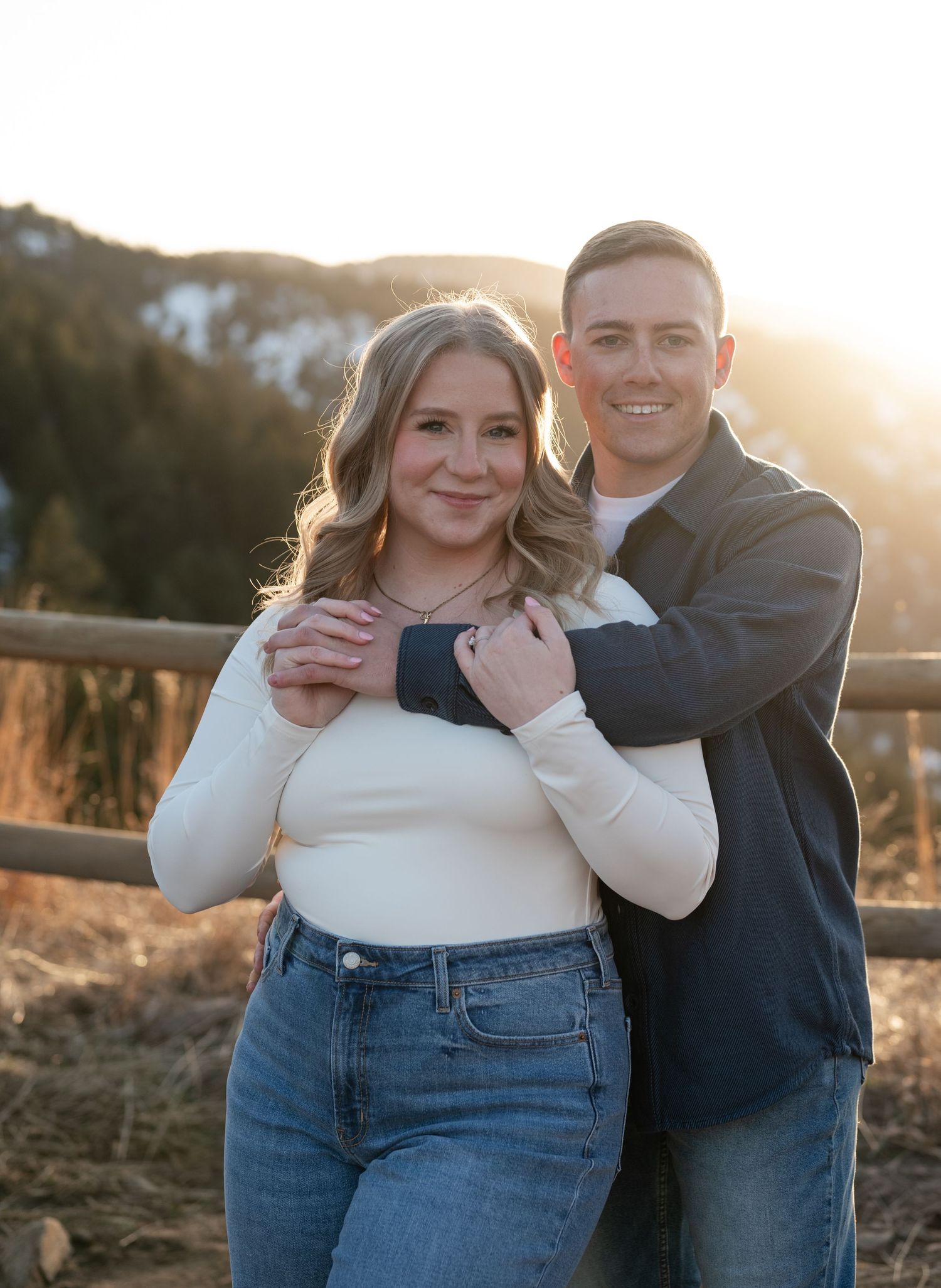 Golden hour mountain engagement photo