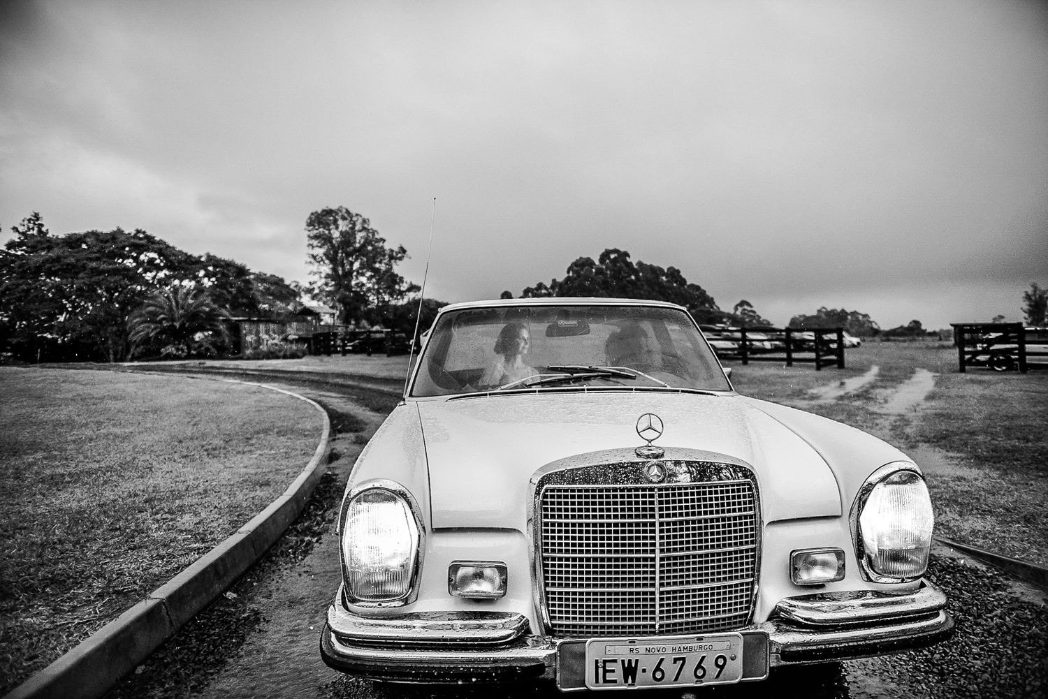 Vintage Mercedes-Benz automobile photographed from front angle in black and white.