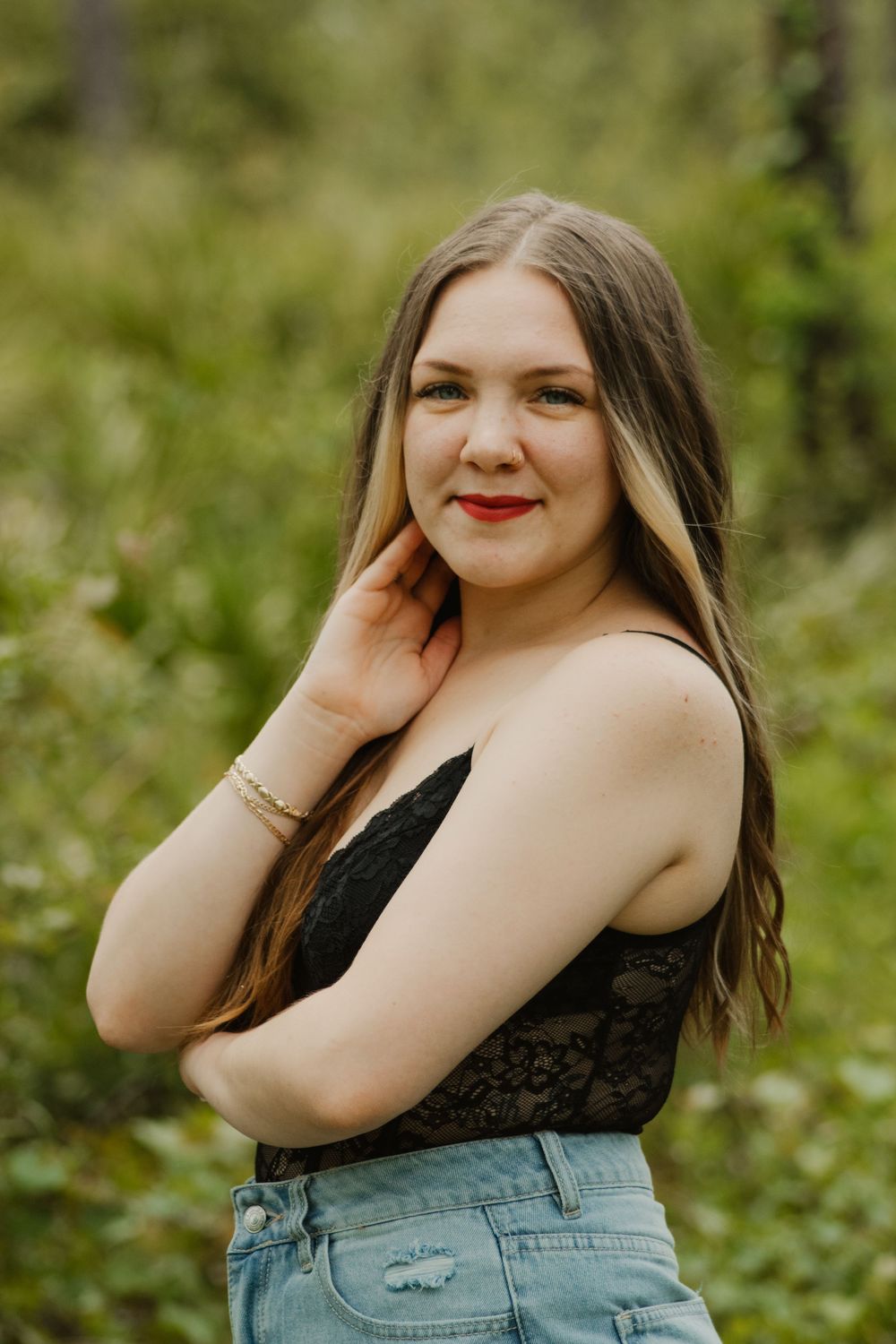 A series of candid outdoor portrait shots showing playful poses against a natural green background.